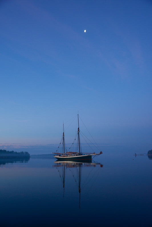 nighttime sailboat photograph