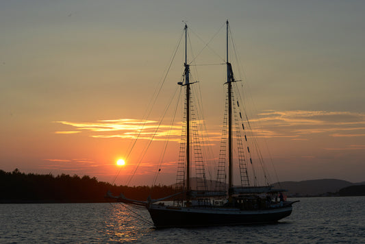 sunset sailboat photograph
